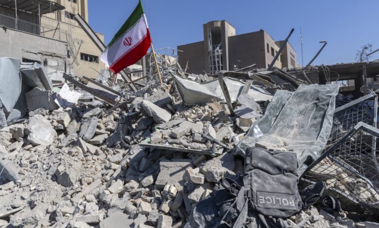Gas station signage showing prices over five dollars in California.